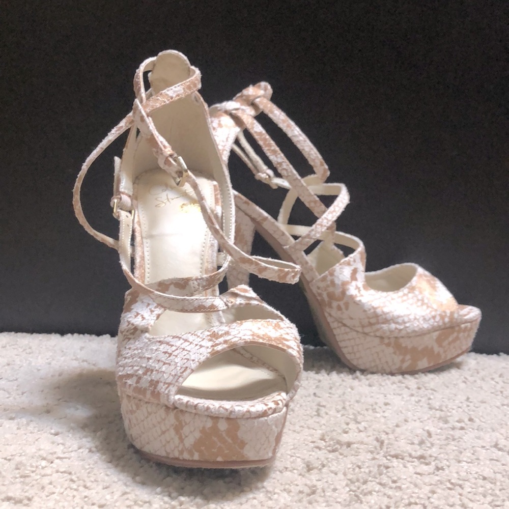 Colin Stuart snake print heeled sandal.